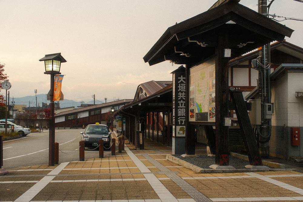 hida furukawa station with taxi outside