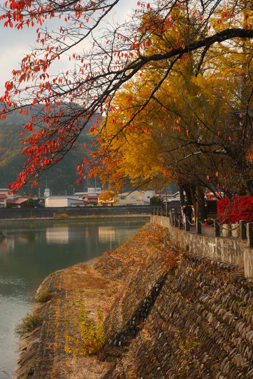 hida furukawa waterside with yellow and red trees